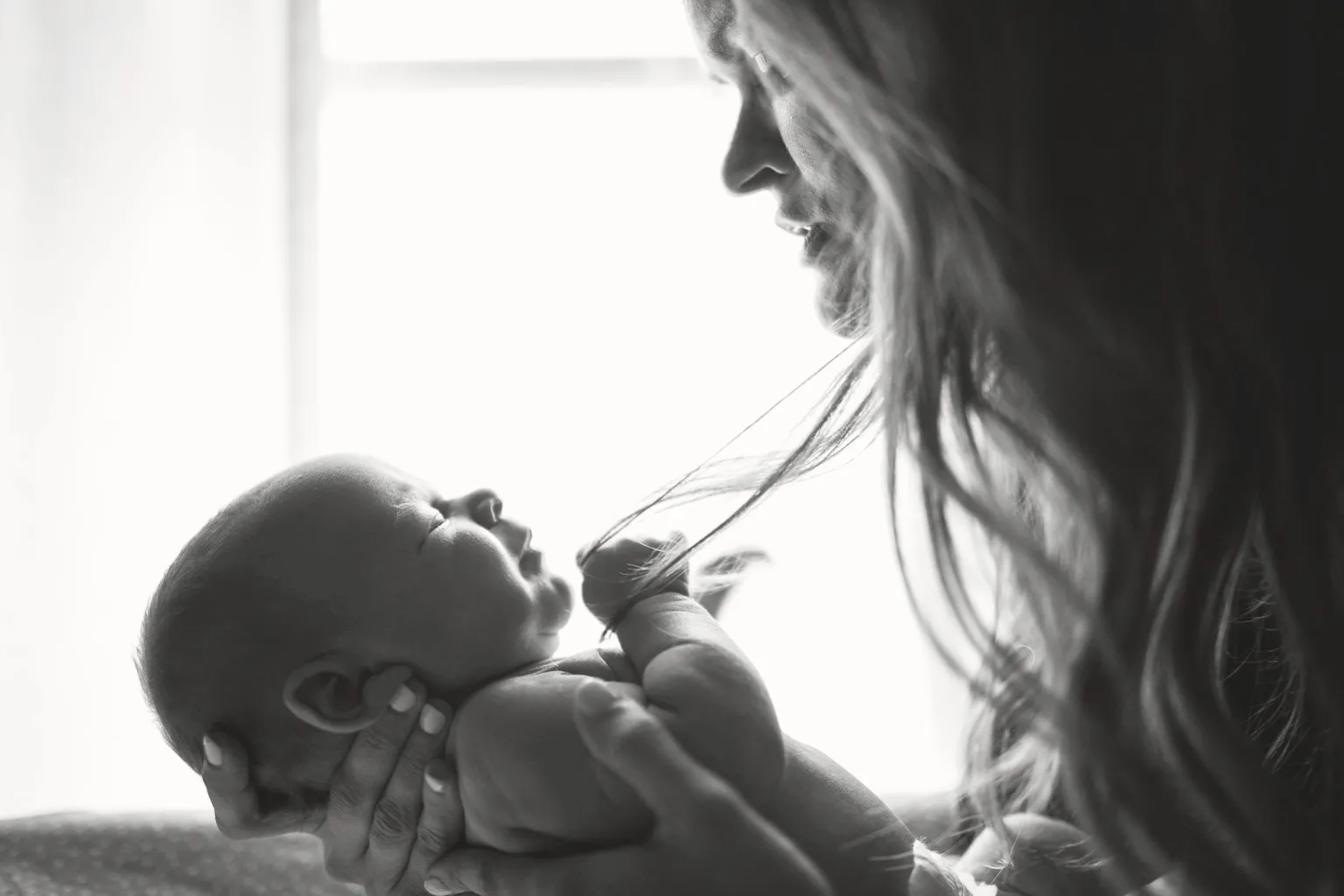Editorial image of a mother and child sharing a quiet moment