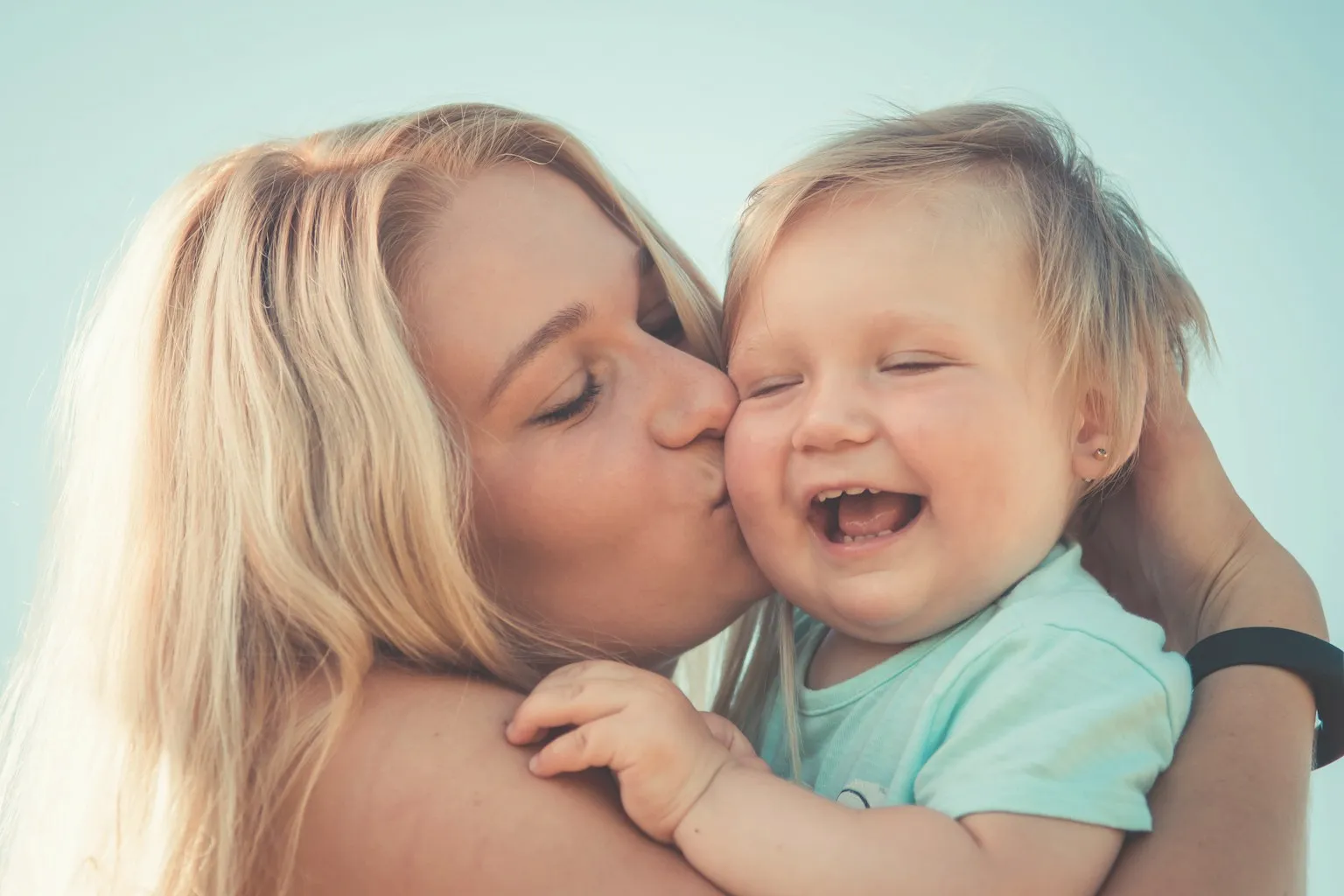 Editorial image of a mother and child sharing a quiet moment